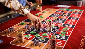Tampilan permainan Bonanza Gold di fio77 dengan gulungan emas dan simbol bonus